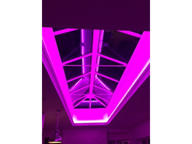 pink lighting around Roof Lantern